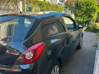 Usata Opel Corsa 80 CV (58 kW) 2010 Nero Utilitaria