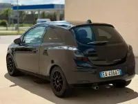 Usata Opel Corsa 100 CV (73 kW) 2010 Nero Utilitaria