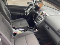 Usata VW Touran 105 CV (77 kW) 2009 Marrone Monovolume