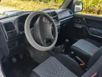 Usata Suzuki Jimny 65 CV (47 kW) 2004 Grigio SUV