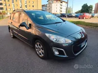 Begagnad Peugeot 308 92 HK (67 kW) 2012 Svart Kombi