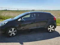 Usata Kia Rio 90 CV (66 kW) 2013 Nero Berlina