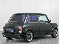 Begagnad Mini Cooper 63 HK (46 kW) 1993 Svart Halvkombi