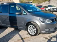 Begagnad VW Touran Comfortline 105 HK (77 kW) 2014 Grå Minibuss