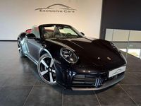 Usata Porsche 911 Carrera Cabriolet 394 CV (289 kW) 2024 Nero brillante/rosso Cabrio