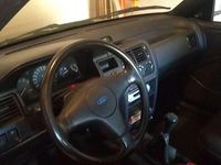 Usata Ford Escort Ghia 88 CV (64 kW) 1992 Grigio Berlina