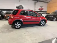 Second-hand Suzuki SX4 90 CP (66 kW) 2011 Roșu SUV