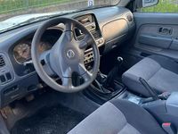 Usata Nissan Navara 133 CV (97 kW) 2004 Bianco Pick-up