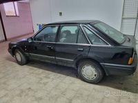 Usata Ford Escort Ghia 61 CV (44 kW) 1990 Nero Berlina