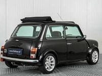 Begagnad Mini Cooper 58 HK (42 kW) 1998 Svart Halvkombi