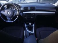 Usata BMW 116 116 CV (85 kW) 2010 Nero Utilitaria