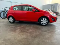 Usata Opel Corsa Edition 85 CV (62 kW) 2013 Rosso Utilitaria