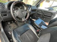 Usata Suzuki Jimny 84 CV (61 kW) 2007 Grigio SUV