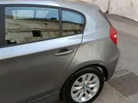 Usado BMW 116 116 HP (85 kW) 2010 Cinzento Citadino