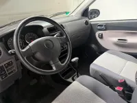 Usata Daihatsu Cuore 58 CV (42 kW) 2003 Argento Utilitaria