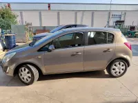 Usata Opel Corsa 85 CV (62 kW) 2011 Marrone Utilitaria