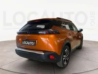 Usata Peugeot e-2008 Allure 100 kW (136 CV) 2021 Arancione SUV