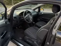 Usata Opel Corsa 85 CV (62 kW) 2010 Nero Utilitaria