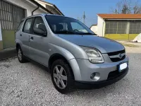 Usado Suzuki Ignis 94 CV (69 kW) 2004 Gris Utilitario