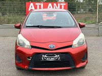 Usata Toyota Yaris Hybrid Lounge 75 CV (55 kW) 2013 Arancione Berlina
