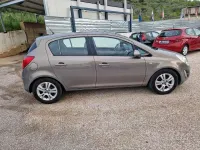 Usata Opel Corsa 95 CV (69 kW) 2012 Marrone Utilitaria