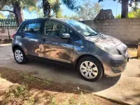 Usata Toyota Yaris 69 CV (50 kW) 2010 Grigio Utilitaria