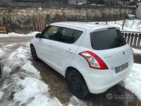 Second-hand Suzuki Swift 94 CP (69 kW) 2013 Alb Berlinǎ