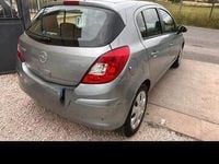 Usata Opel Corsa 45 CV (33 kW) 2012 Grigio Utilitaria