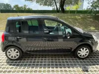 Käytetty Renault Modus Dynamique 75 HP (55 kW) 2010 Musta Tila-auto
