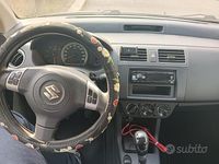 Begagnad Suzuki Swift 70 HK (51 kW) 2006 Svart Halvkombi