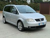 Käytetty VW Touran Highline 169 HP (124 kW) 2007 Harmaa Tila-auto