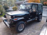 Usata Jeep Wrangler Laredo 103 CV (75 kW) 1989 Nero SUV