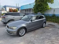 Usata BMW 116 116 CV (85 kW) 2009 Grigio Utilitaria