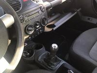 Usata VW New Beetle 105 CV (77 kW) 2006 Rosso Utilitaria