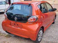 Usata Toyota Aygo Connect Style 67 CV (49 kW) 2013 Arancione Utilitaria
