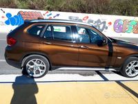 Usata BMW X1 177 CV (130 kW) 2009 Marrone SUV