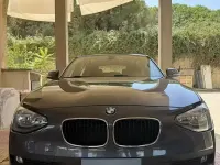 Usata BMW 118 143 CV (105 kW) 2012 Grigio Utilitaria