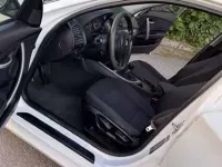 Usata BMW 116 122 CV (89 kW) 2009 Bianco Utilitaria