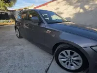 Usata BMW 118 Lifestyle 143 CV (105 kW) 2010 Grigio Utilitaria