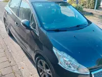 Usata Peugeot 208 92 CV (67 kW) 2012 Nero Utilitaria