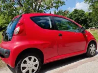 Käytetty Peugeot 107 68 HP (50 kW) 2010 Punainen Viistoperä