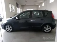 Käytetty Renault Scenic E-Tech Dynamique 110 HP (80 kW) 2011 Harmaa Tila-auto