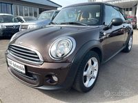 Begagnad Mini ONE 74 HK (54 kW) 2012 Brun Halvkombi