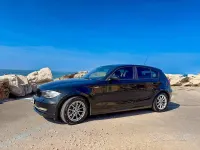 Usata BMW 120 177 CV (130 kW) 2008 Nero Utilitaria
