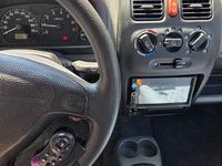 Second-hand Suzuki Wagon R+ 76 CP (55 kW) 2002 Albastru Monovolum