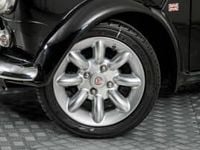 Begagnad Mini Cooper 58 HK (42 kW) 1998 Svart Halvkombi