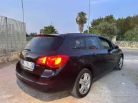 Usata Opel Astra 110 CV (80 kW) 2011 Nero Berlina