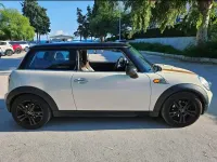 Usata Mini Cooper 120 CV (88 kW) 2009 Beige Utilitaria