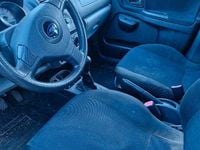 Usata Subaru Justy 94 CV (69 kW) 2005 Grigio Utilitaria