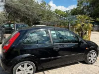 Second-hand Ford Fiesta Ambiente 75 CP (55 kW) 2004 Negru Hatchback